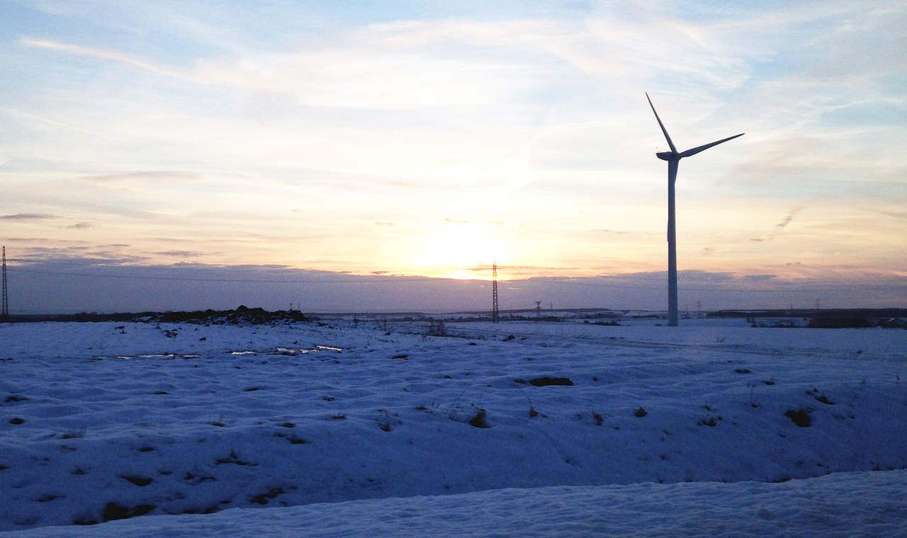 Wind power in a snowy landscape. Photo.