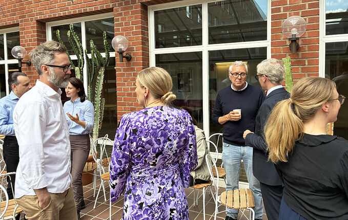 People mingling. Photo.