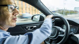 Person driving car. Photo.