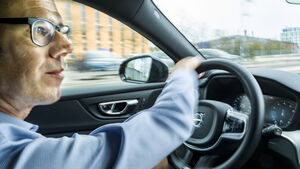 Person driving car. Photo.