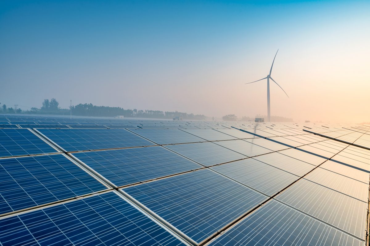 Solar panels and wind turbine. Photo.