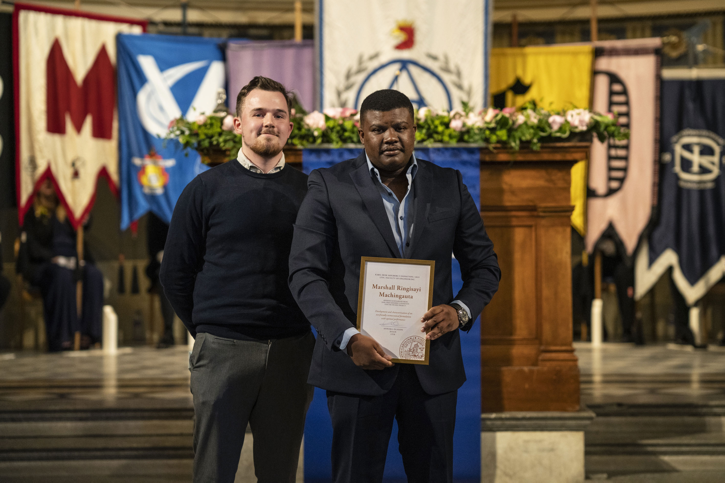 Two men at LTH's graduation ceremony. Photo