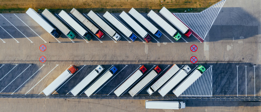 Trucks on a parking lot. Photo.